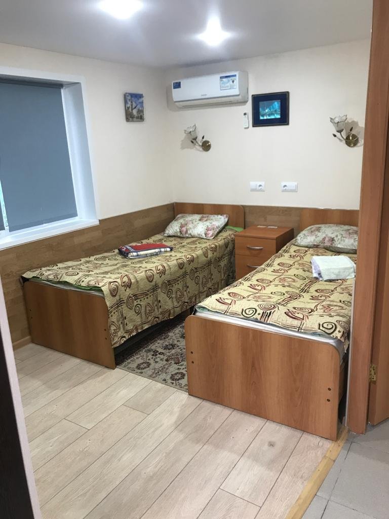 Уютный номер с двумя кроватями